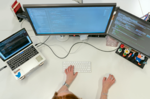 woman with multiple screens